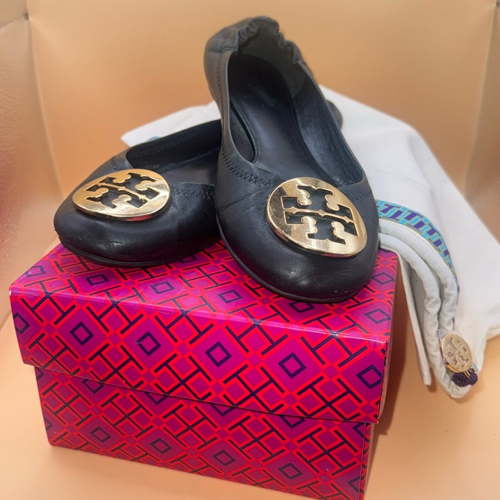 Tory Burch flats with gold emblem, size 6.5
